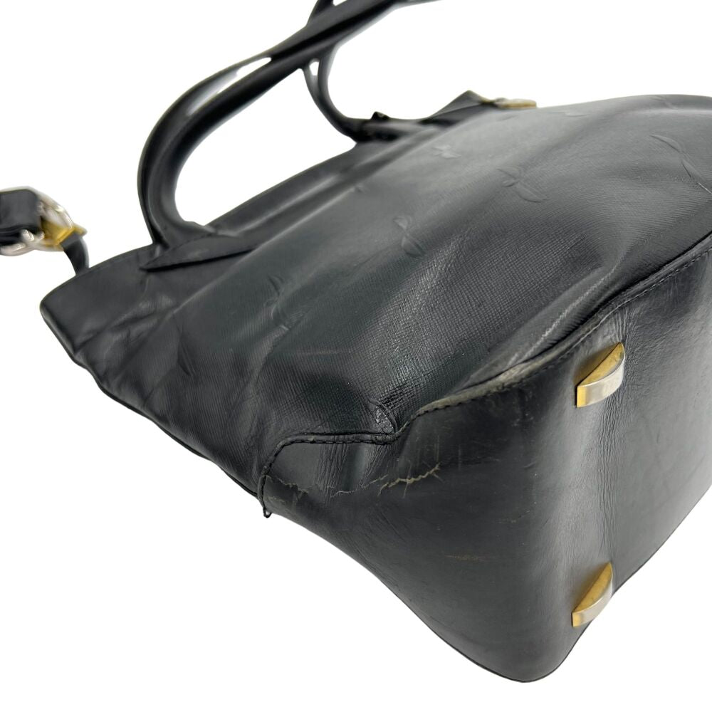 Sac à main en cuir noir avec motifs