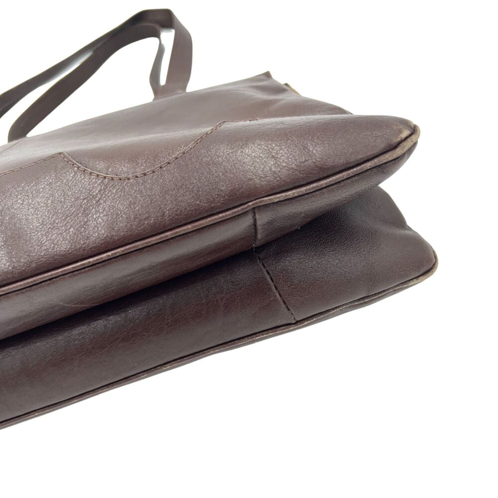 Sac à main en cuir marron foncé avec petites anses