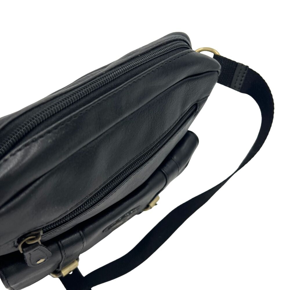 Sac à bandoulière en cuir noir avec poches avant