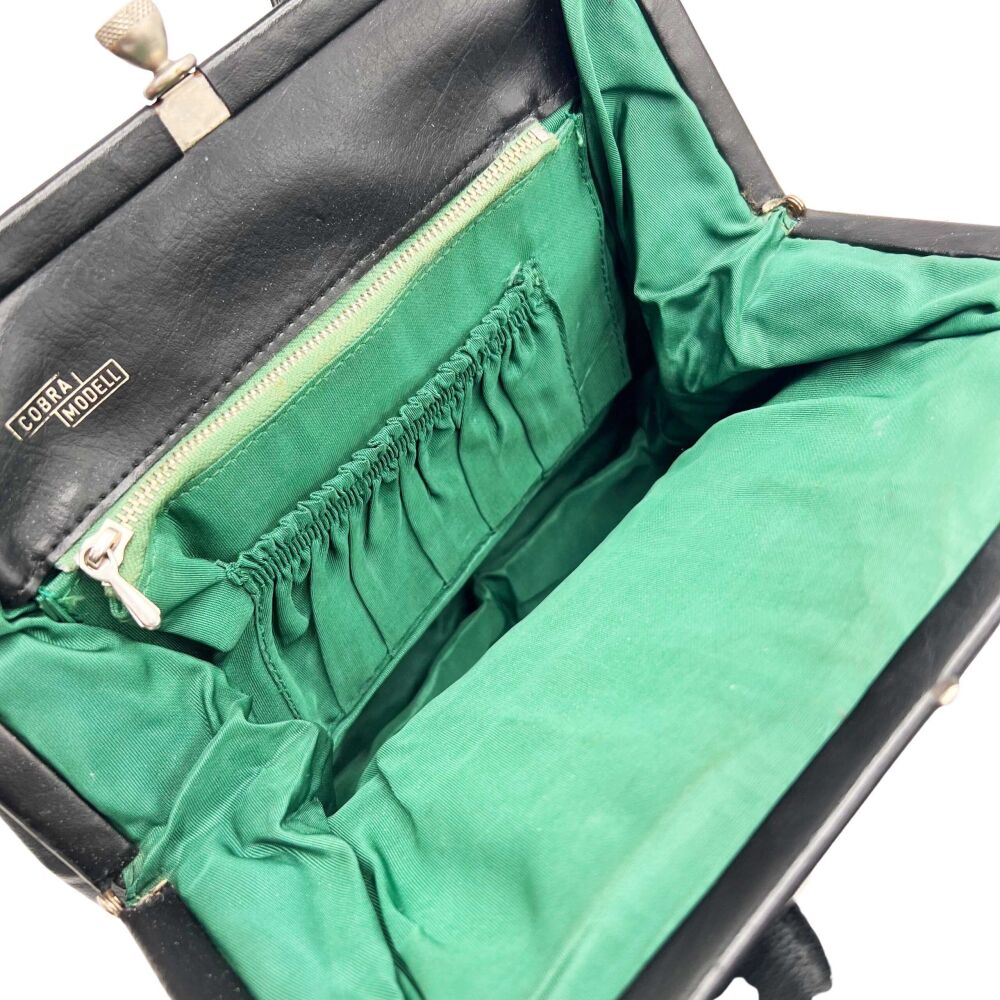 Sac à main en cuir noir intérieur vert