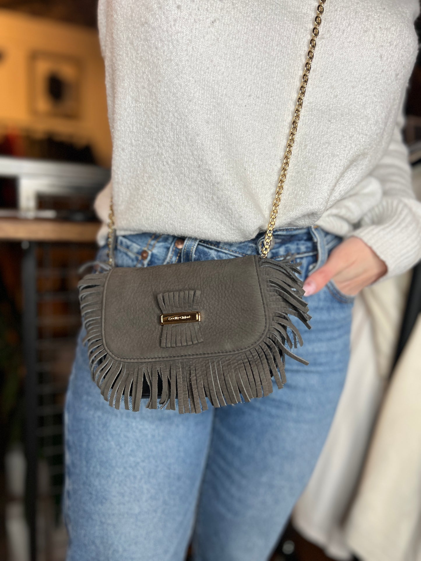 Sac à bandoulière en cuir et daim